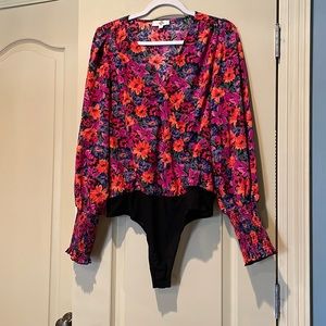 Beautiful spring/summer floral body suit from boutique